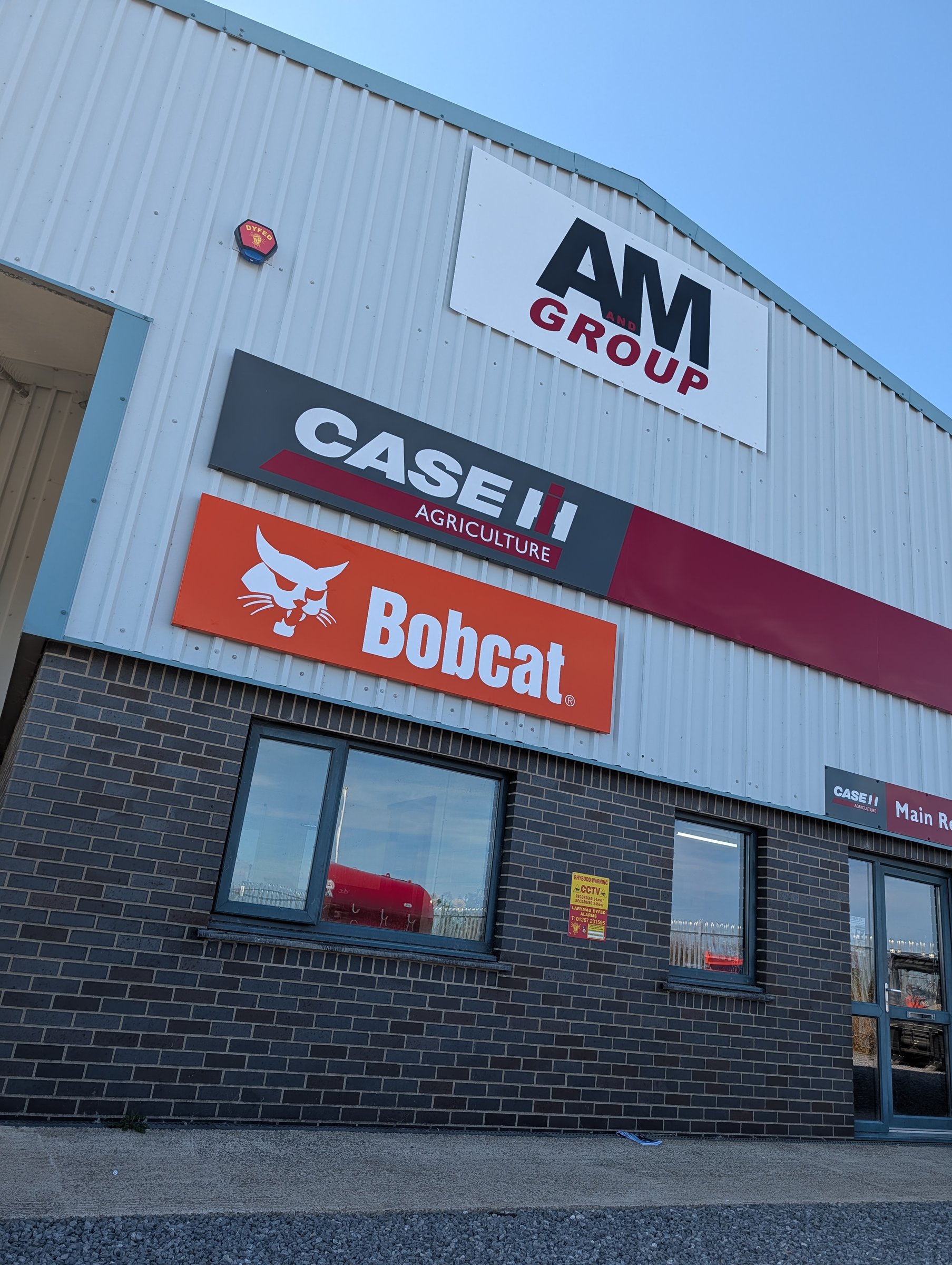 A&M Group dealership facade signage