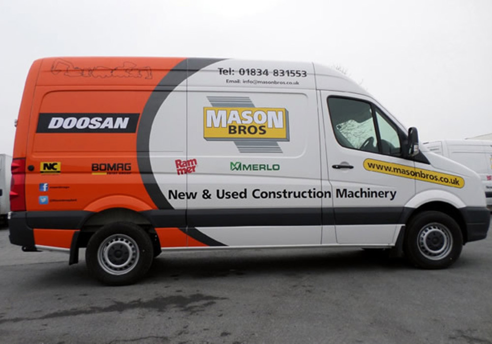 Commercial van with orange black and white Mason Bros vehicle graphics