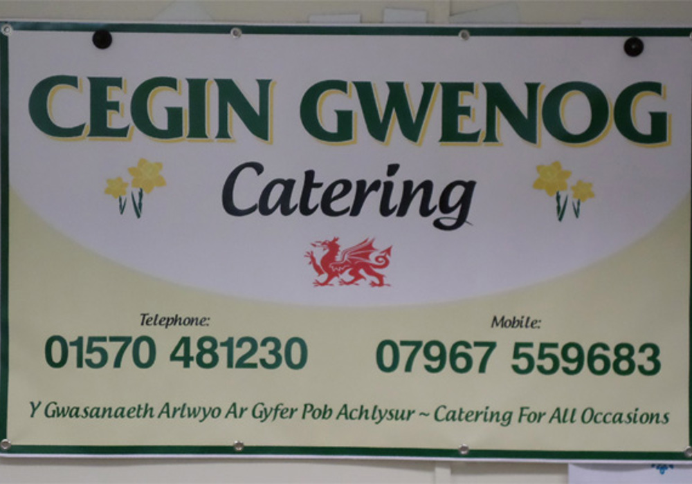 Cegin Gwenog Catering sign with clear green branding
