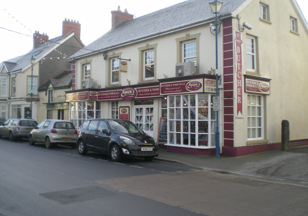 Retail premises with coordinated fascia signage around large front windows