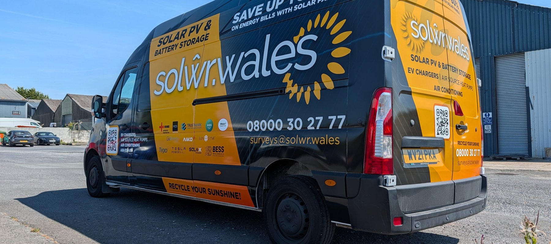 White commercial van with clean branded vehicle graphics produced by Eagle Signs