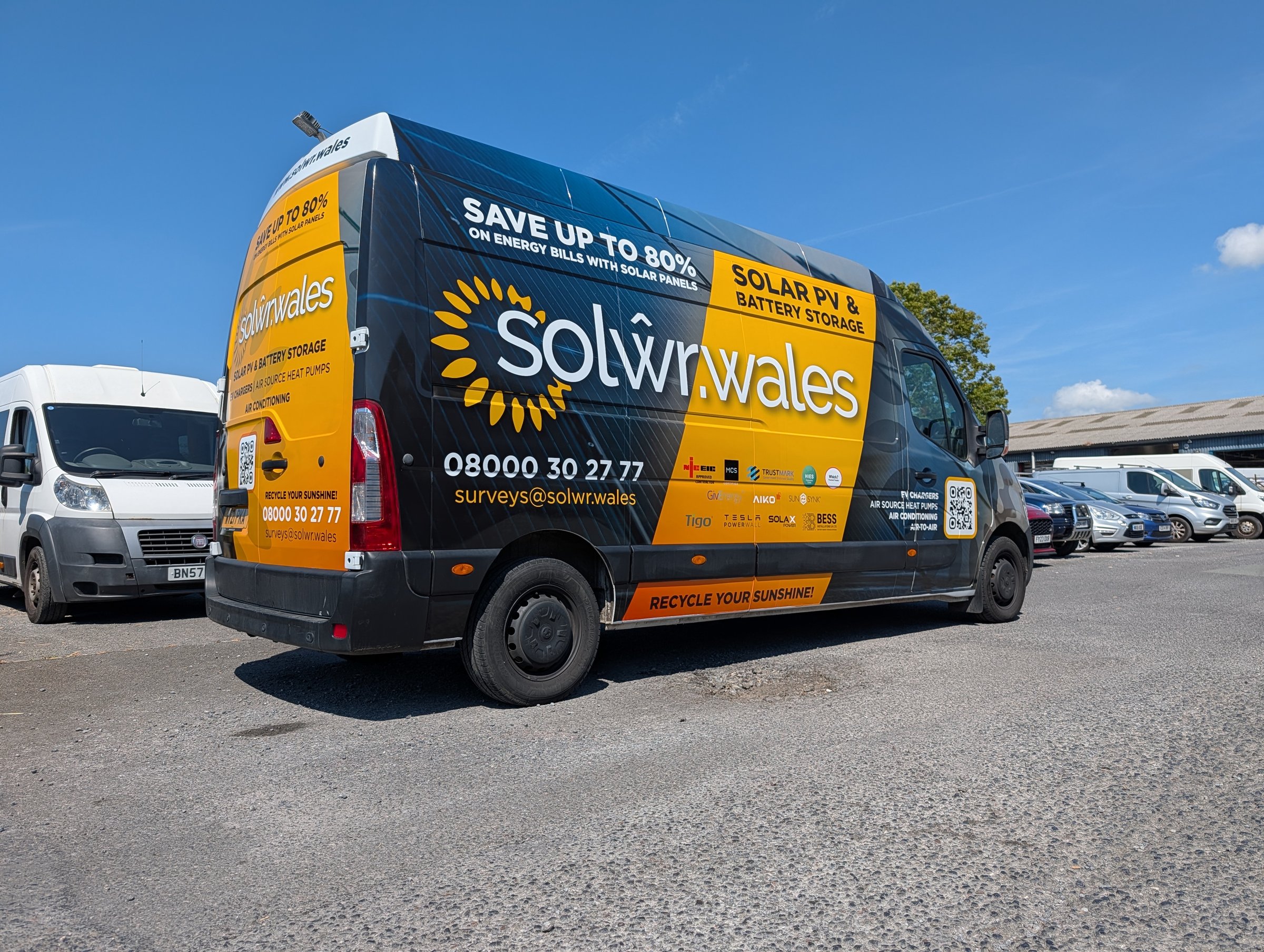 SOLŴR Wales wrapped van rear side view